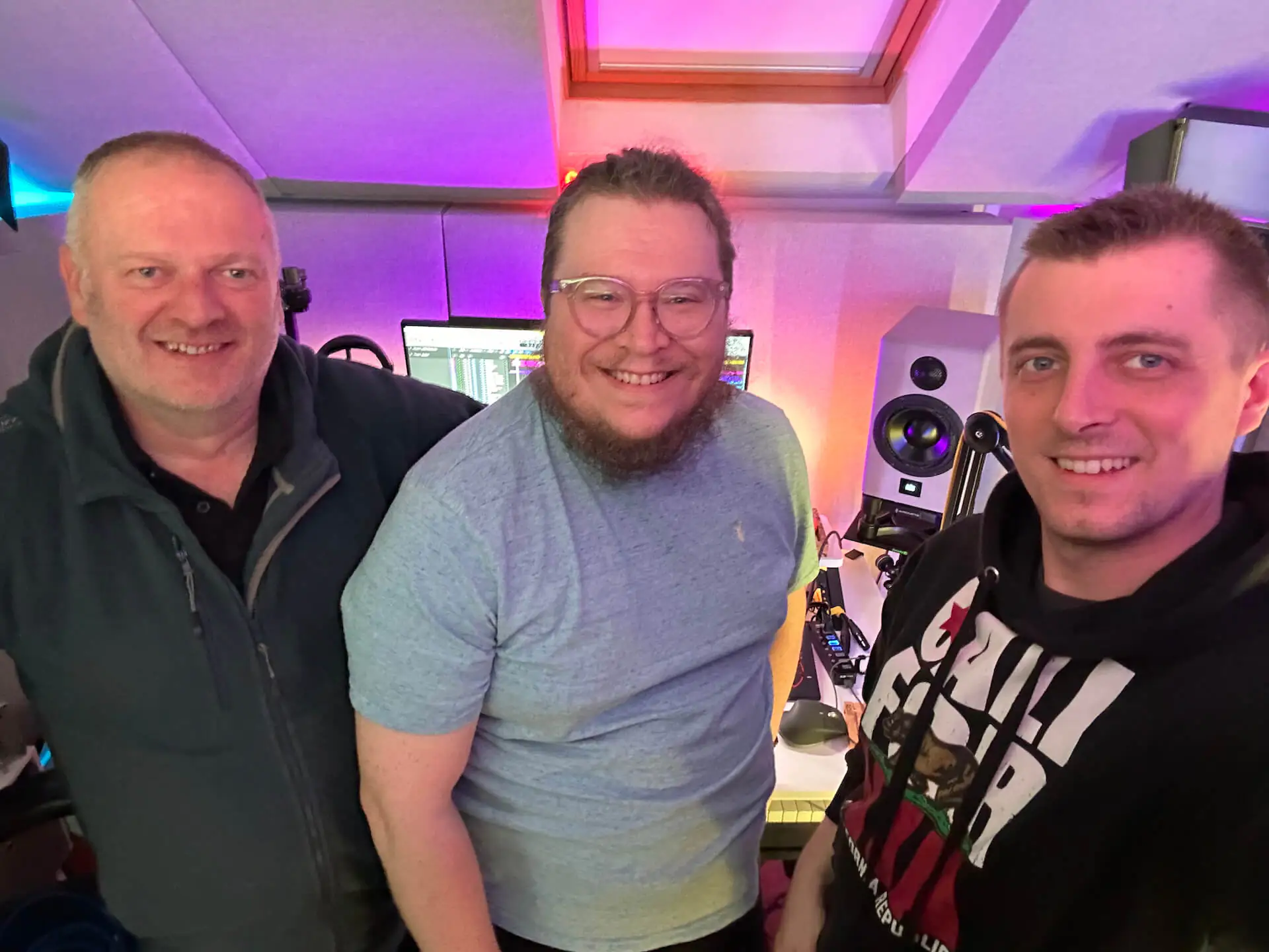 Mark, James & Shane standing in Shane's studio with a MUM-6 visible in the background.